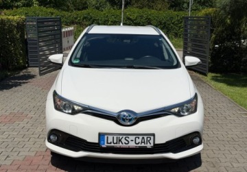 Toyota Auris II Touring Sports Facelifting 1.8 Hybrid 136KM 2017 Toyota Auris 1,8 HYBRID Lift Kamera KEY-LESS PDC Bezwypadkowy ASO Dla wyma, zdjęcie 7