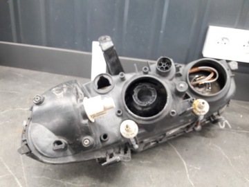 90565802RH SVĚTLOMET PRAVÝ OPEL OMEGA B XENON HELLA