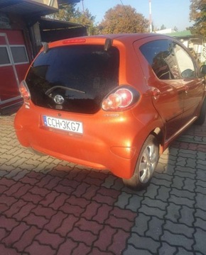 Toyota Aygo I Hatchback 5d Facelifting 1.0 VVT-i 68KM 2013 Toyota Aygo Toyota Aygo AUTOMAT,PIEKny kolor, zdjęcie 3