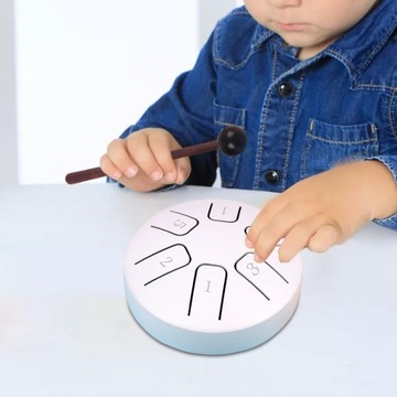 Развивающие игрушки со стальным язычком белого цвета.