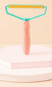 Щетка для бритвы, чтобы удалить волосы из одежды