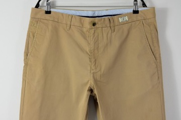 TOMMY HILFIGER BEŻOWY CHINO SPODNIE CASUAL W38 L32