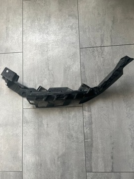 Mocowanie lampy przedniej L SEAT OE 575807889A