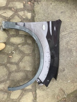 NISSAN QUASHQAI J10 LIFT BŁOTNIK PRAWY PRZÓD