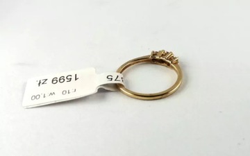 ЗОЛОТОЕ КОЛЬЦО 375 С БРИЛЛИАНТАМИ 1,30 Г СЕРТИФИКАТ