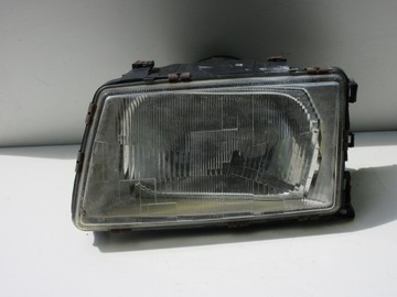 Reflektor lampa lewy Audi 100 C3 cygaro DEPO