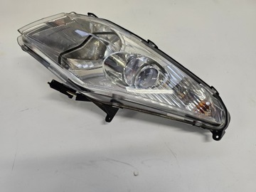 PEUGEOT SATELIS 125/250/500 лампа передней фары левая