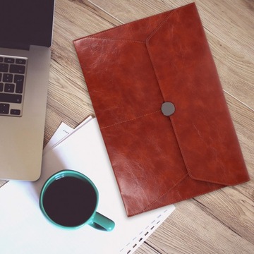 Большая вместительная сумка для хранения из искусственной кожи формата А4.