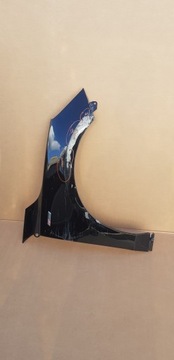 FORD FOCUS MK4 ST BŁOTNIK PRZEDNI PRAWY