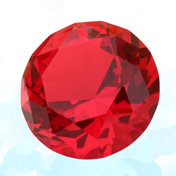 Круглое пресс-папье с синтетическим бриллиантом и крупным бриллиантом.