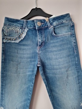 Desigual damskie spodnie jeans flare XS/24
