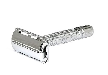 Помазок для бритья с лезвиями на металлической подставке.