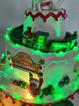WIOSKA DEKORACJA ŚWIĄTECZNA GÓRA LODOWA MAGIC VILLAGE MELODYJKA LED RUCH