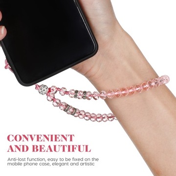 Белый ремешок на руку с подвеской.