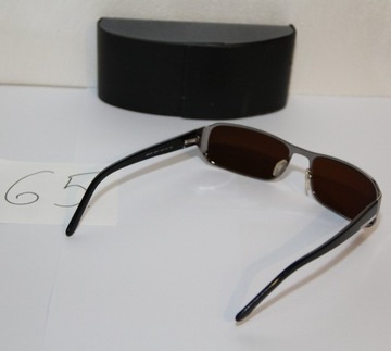 Damskie okulary przeciwsłonec. Prada SPR 06N Nr-76