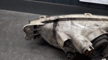 100-87150 SVĚTLOMET PRAVÝ MITSUBISHI COLT V 3D 96-04R