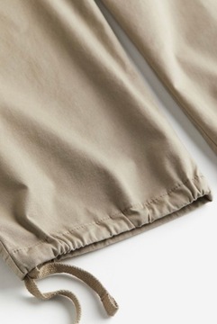 Luźne bawełniane spodnie męskie cargo Loose fit H&M beżowe rozmiar M