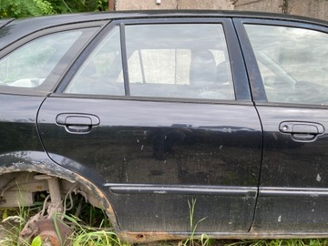DVEŘE PRAVÉ ZADNÍ MAZDA 323F BJ 16W