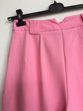 Reserved, różowe spodnie w kantkę, r M
