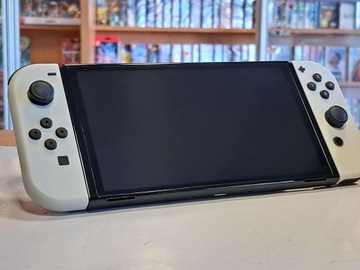 НАБОР NINTENDO SWITCH OLED + 2 ИГРЫ + ЧЕХОЛ + РУЛЕВЫЕ КОЛЕСА