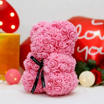РОЗОВЫЙ МИШКА 25СМ С ЛЕПЕСТКАМИ РОЗ + ПОДАРОЧНАЯ КОРОБКА