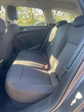 Opel Astra J Sports Tourer 1.7 CDTI ECOTEC 110KM 2012 Opel Astra KLIMATYZACJA PARKTRONIC EL.SZYBY EL.LUSTERKA NOWY ROZRZAD GWARA, zdjęcie 4