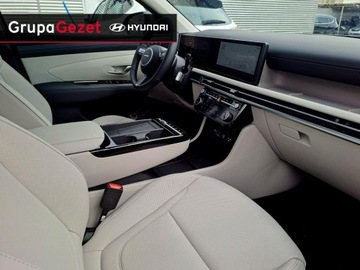 Hyundai Tucson IV SUV HEV Facelifting 1.6 T-GDI HEV 215KM 2025 Hyundai Tucson 215 KM HEV Platinum Tapicerka beżowa MMH Cypress Green Pear, zdjęcie 11