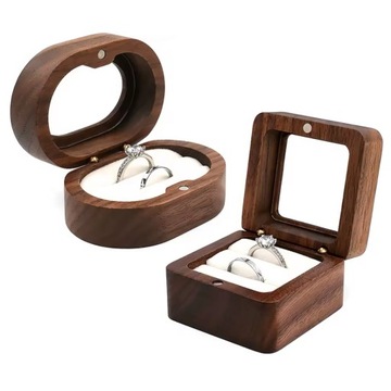 Коричневая коробочка с подушечкой для обручальных колец.