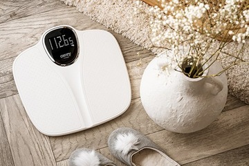 Весы для ванной с функцией взвешивания ребенка.