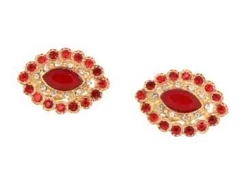 Золотые серьги с красными кристаллами.