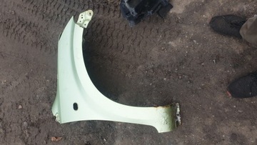 DAIHATSU SIRION II BŁOTNIK PRAWY PRZÓD PRZEDNI