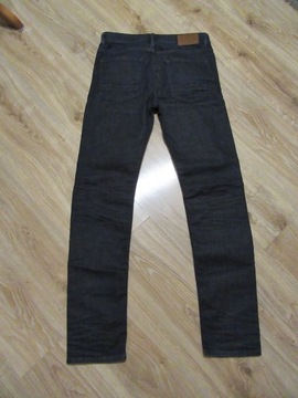 HUGO BOSS ORANGE męskie jeansy spodnie granat_ 31/34