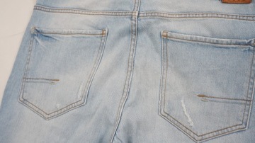 RESERVED spodnie jeansy z dziurami r 33 k2