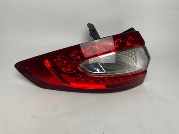 LAMPA LEWA TYŁ W BŁOTNIK MONDEO MK5 KOMBI