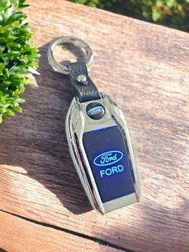 БРЕЛОК ДЛЯ БРЕЛКА FORD GLOW LIGHTER ELEGANT со светодиодной подсветкой, ЧЕХОЛ С ЛОГОТИПОМ, БАНТ