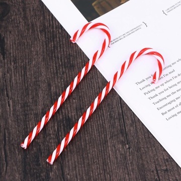 18 мерцающих конфет в виде рождественских кольев для лужайки.