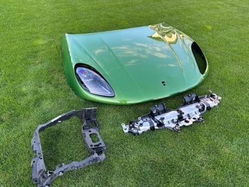 OKULAR LEWY WZMOCNIENIE PORSCHE MACAN 95B805295