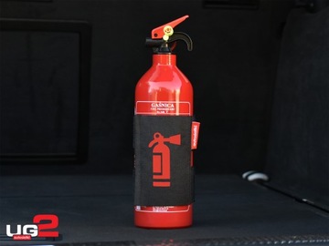 Универсальный автомобильный держатель для огнетушителя на липучке.