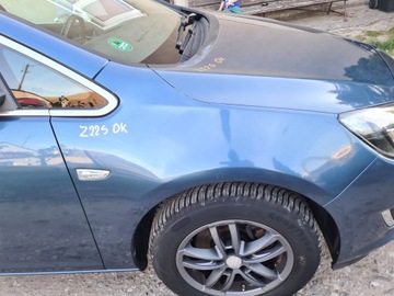 BŁOTNIK PRAWY PRZEDNI OPEL ASTRA J Z22S