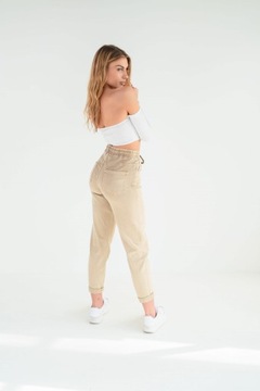 Beżowe damskie spodnie elastyczne jeansy podwijane nogawki guma w pasie L