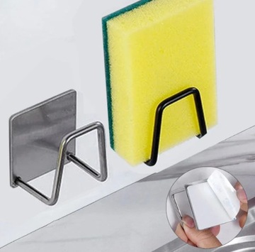 Металлический держатель для губки на стену кухонной мойки.