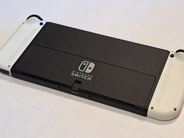 НАБОР NINTENDO SWITCH OLED + 2 ИГРЫ + ЧЕХОЛ + РУЛЕВЫЕ КОЛЕСА