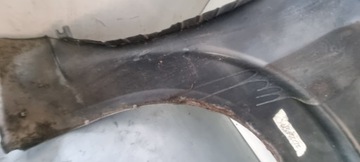 BLATNÍK LEVÝ PŘEDNÍ NISSAN NAVARA D40