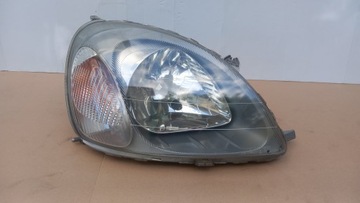 Toyota Yaris I 99r-> lampa reflektor przód prawy BYDGOSZCZ