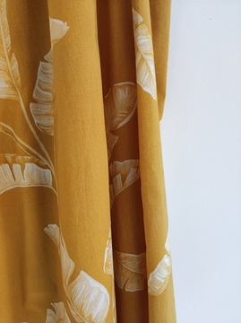 44/46 H&M sukienka bursztynowa letnia liście palmy na ramiączkach falbana