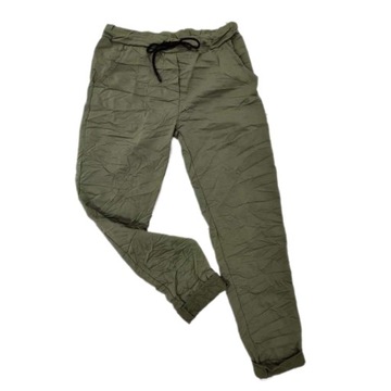 Брюки больших размеров со складками разных цветов.