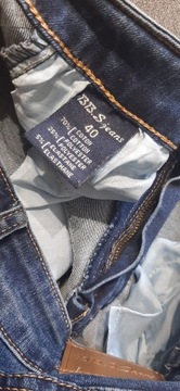 1058. BB S Jeans granatowe jeansy rurki z zamkami i cyrkoniami r 40