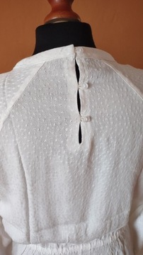 Kremowa bluzka z baskinką Sinsay roz.M