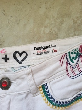 Spodnie dżinsowe Desigual rozm  30 kremowe