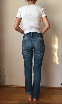 Niebieskie spodnie jeansy dżinsy KappAHL 38